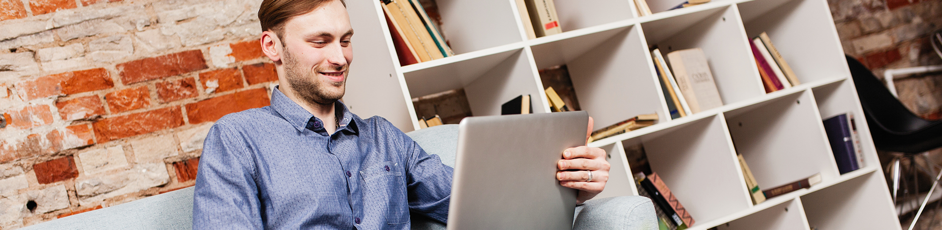 Man sitting with a laptop